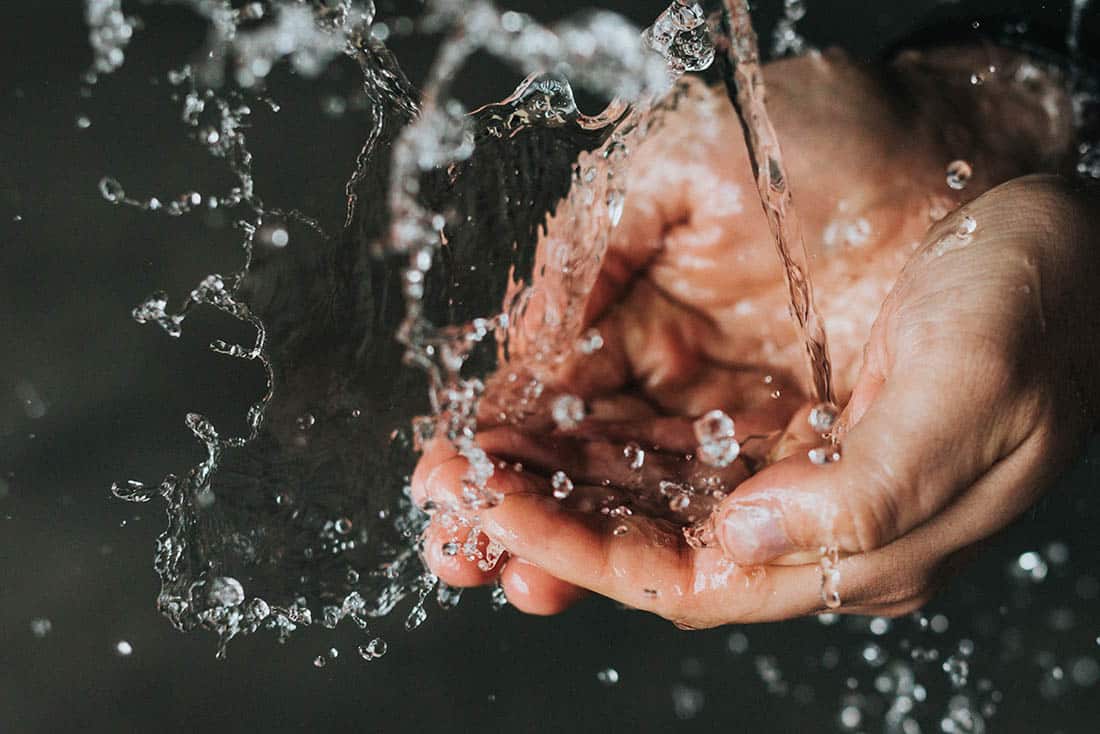 plumbing-WellPumpsAndTanks-Supporting-1100×734 Two hands gathering clean water
